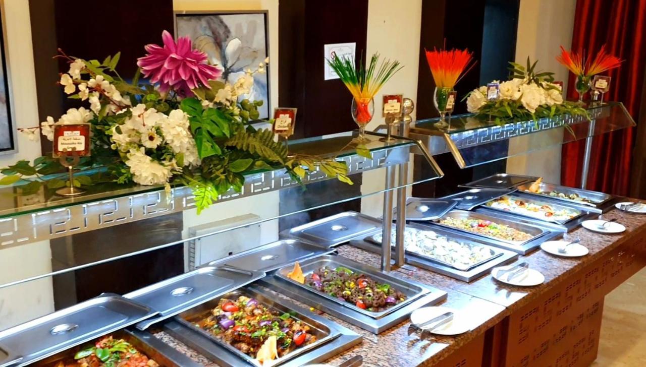 Jewel Sport City And Aqua Park Cairo Exterior photo A buffet at a hotel