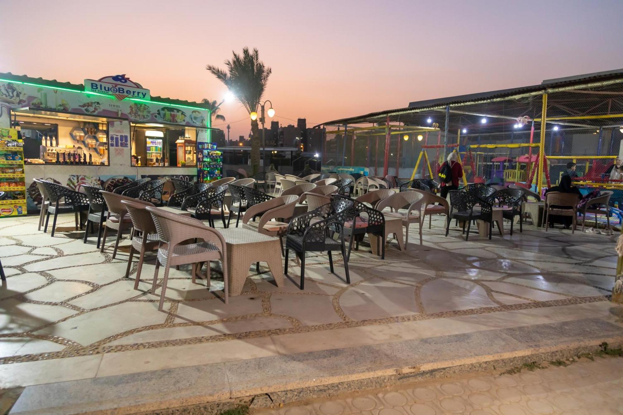 Jewel Sport City And Aqua Park Cairo Exterior photo A cafe in the city